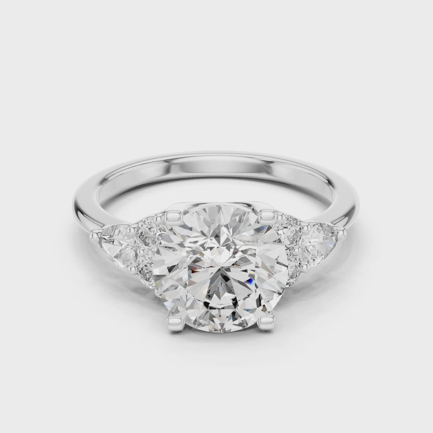 Valencia Round Diamond Three Stone Ring