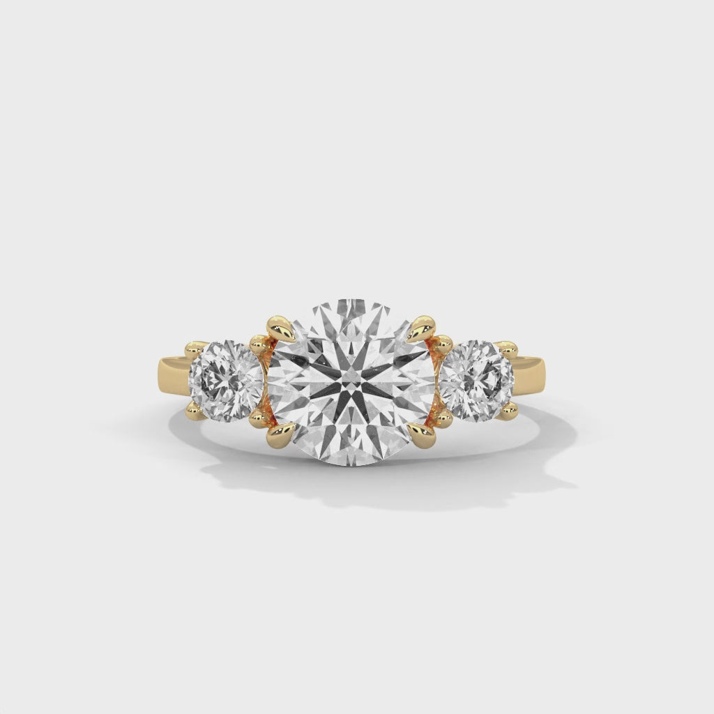 Vintage Round Three Stone Engagement Ring with Classic Prong Setting