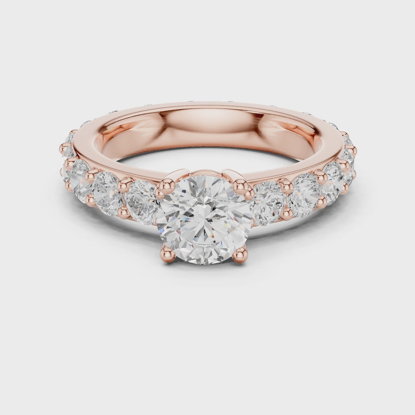 Radiant Arc Round Diamond Shared Prong Engagement Ring