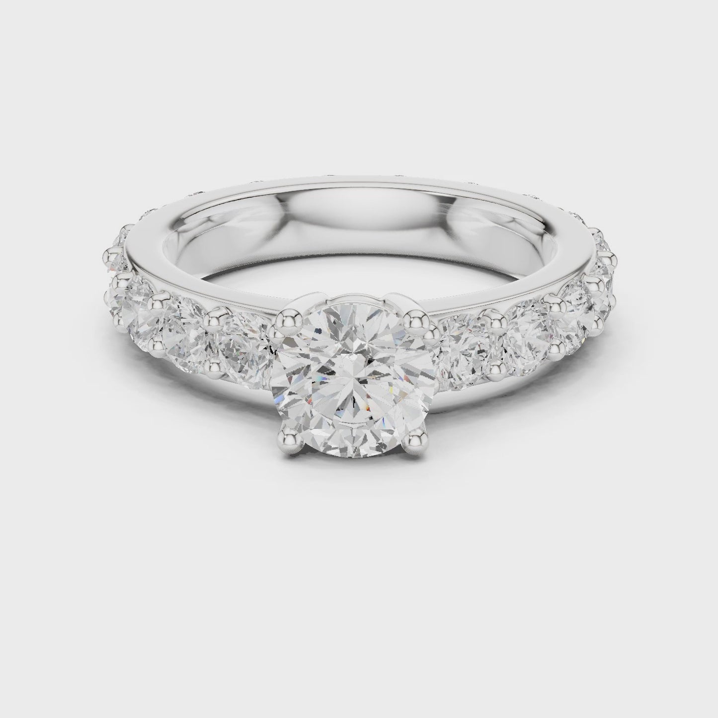 Radiant Arc Round Diamond Shared Prong Engagement Ring