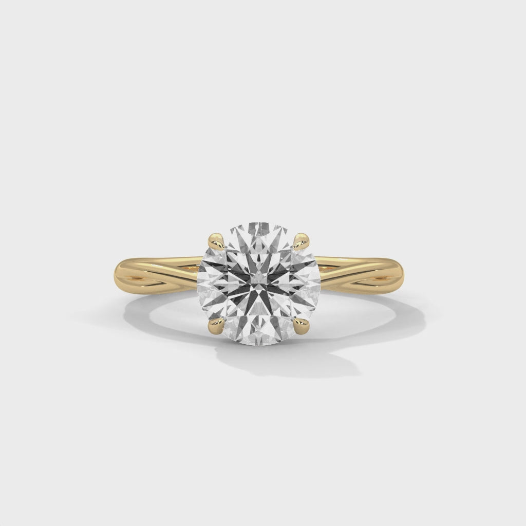 Eterna Twisted Round Cut Solitaire Engagement Ring