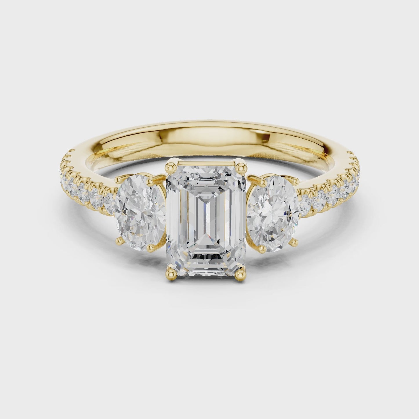 Axis Radiance Emerald & Oval Three Stone Diamond Ring