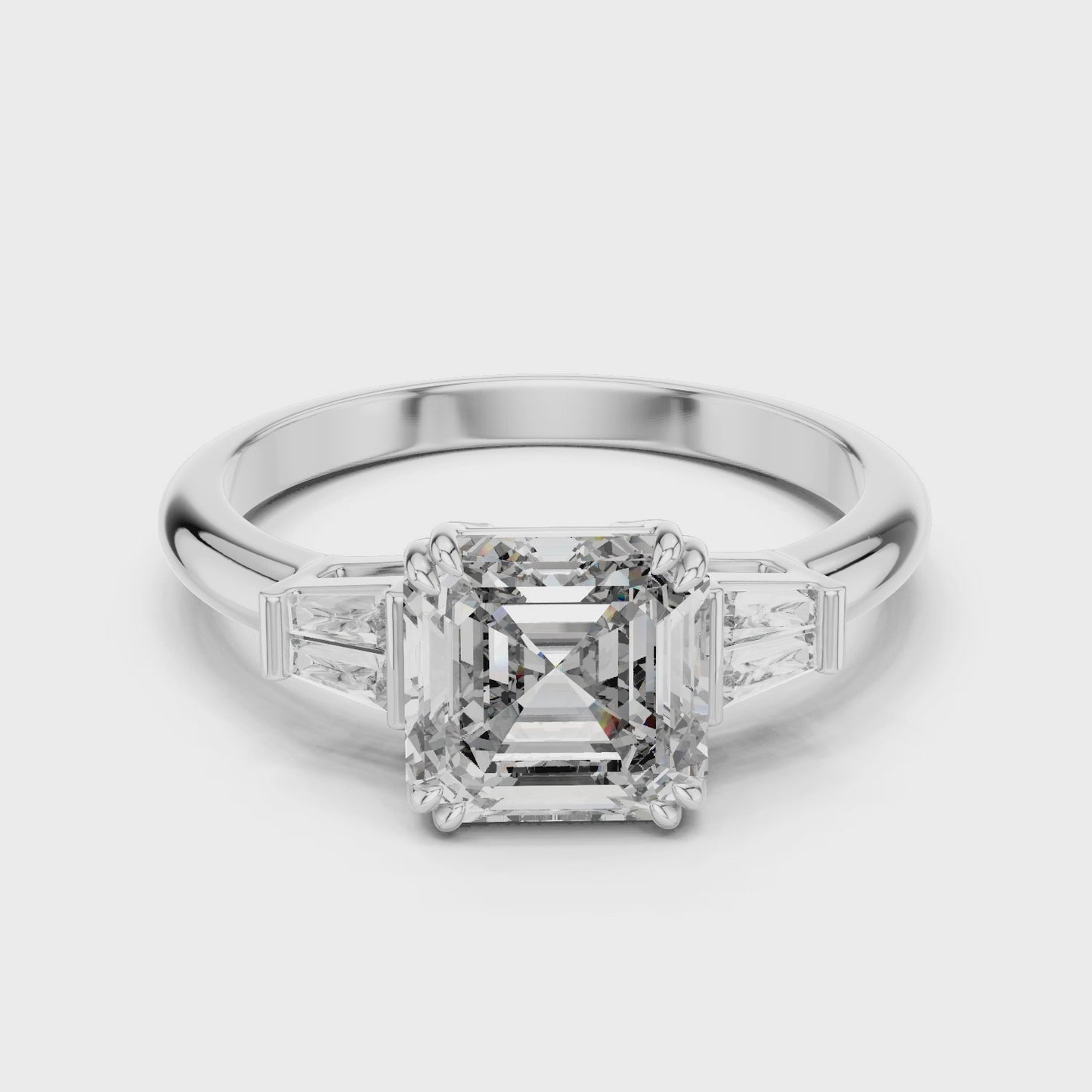 Linear Edge Emerald Cut Three Stone Diamond Ring