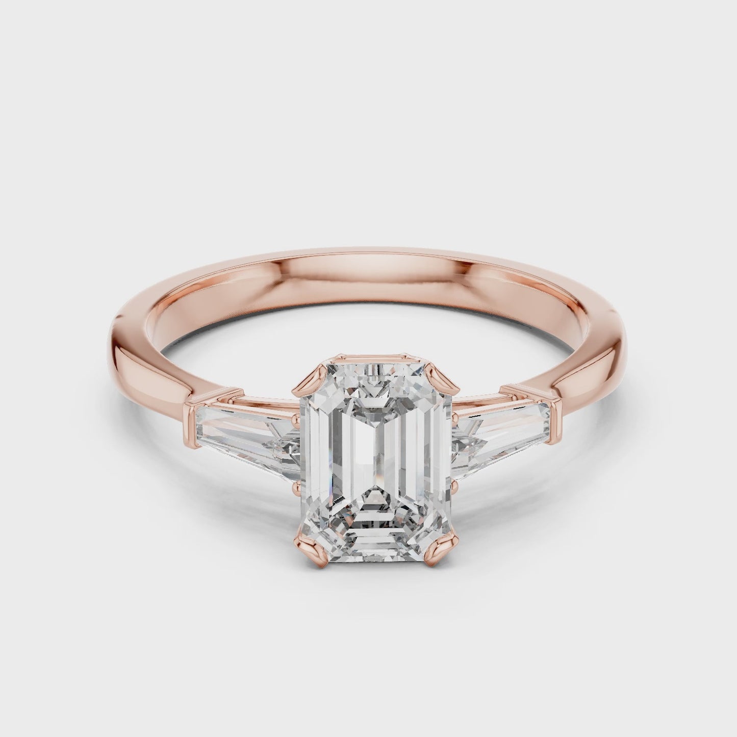 Emerald Cut Three Stone Engagement Ring with Tapered Side Stones