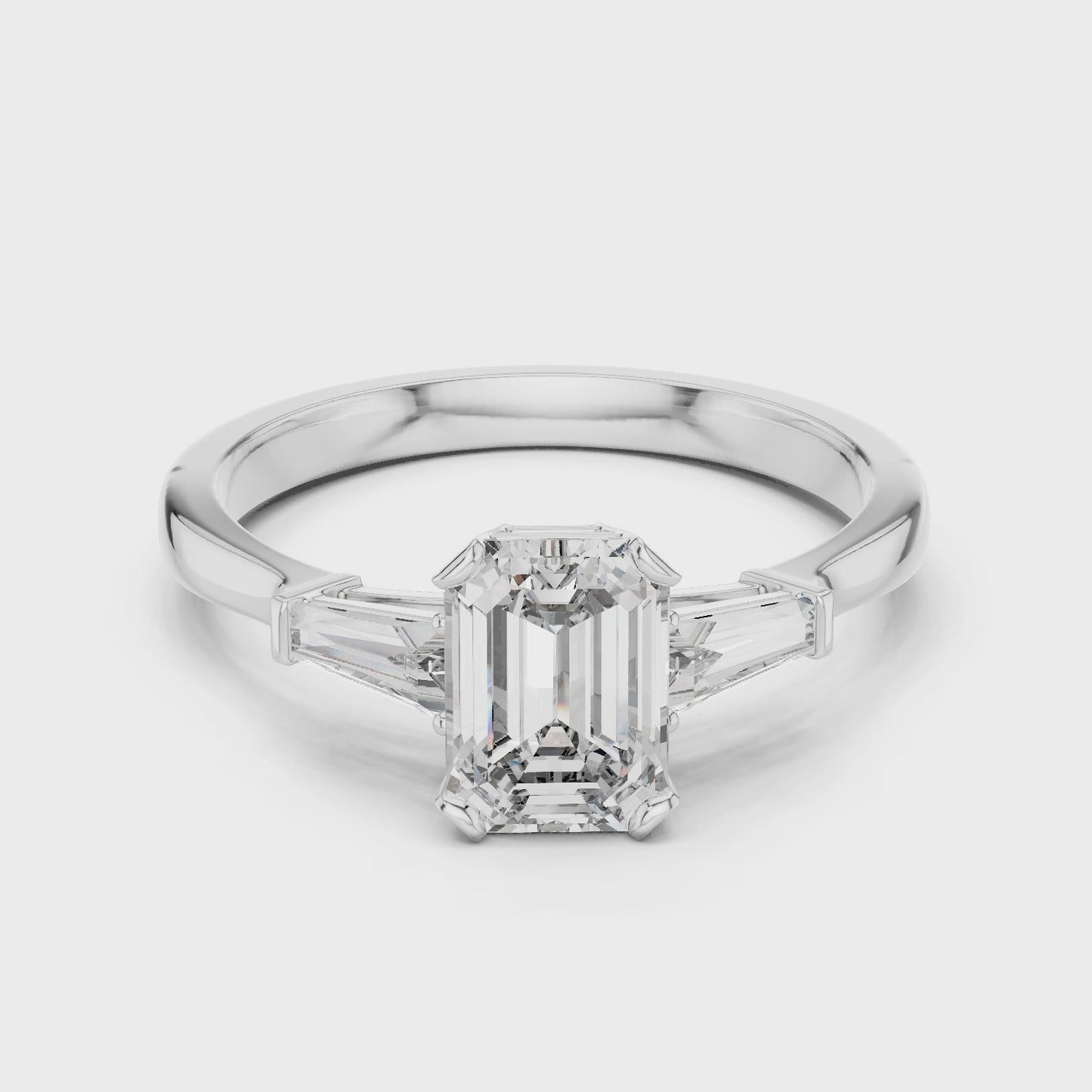 Emerald Cut Three Stone Engagement Ring with Tapered Side Stones