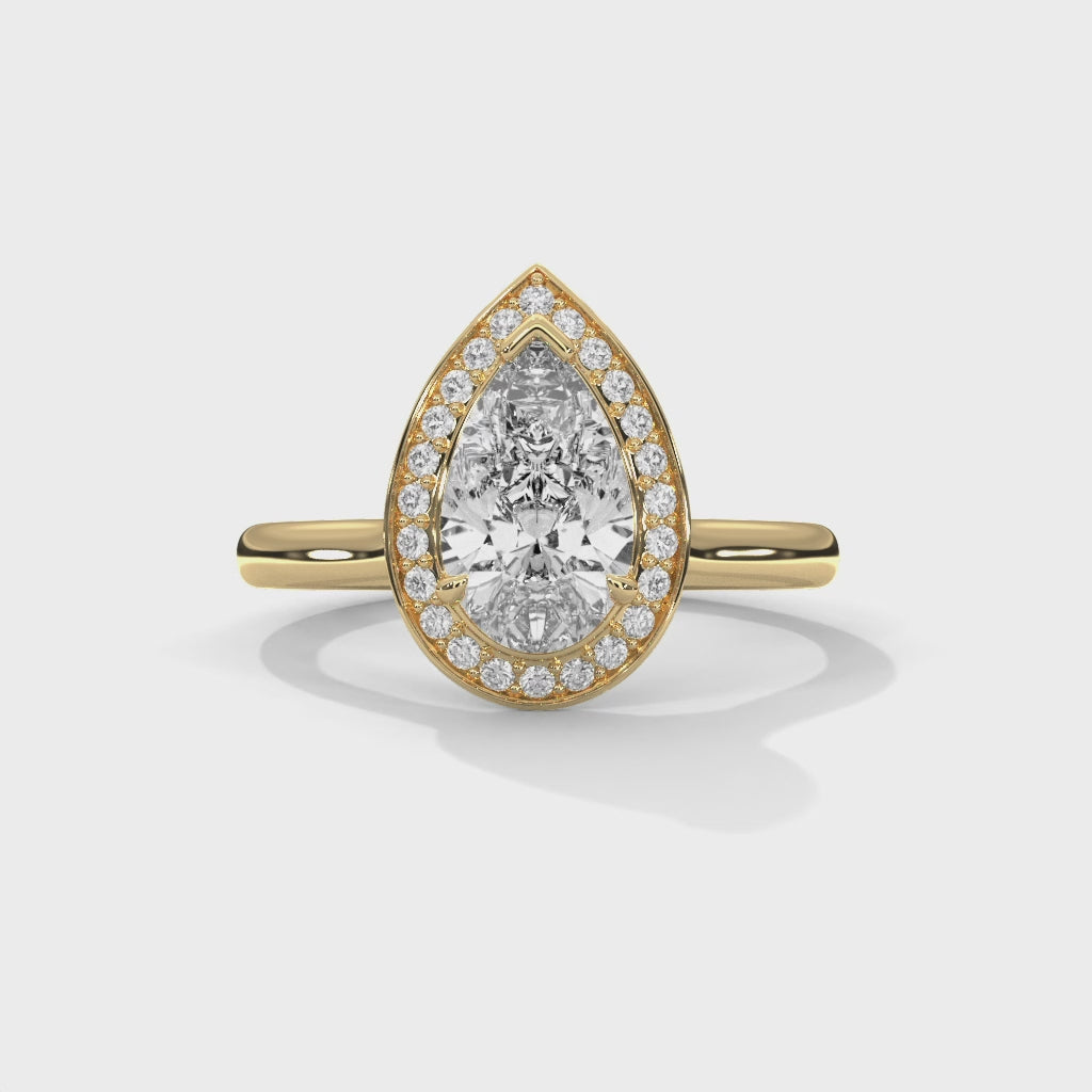Luminous Drop Pear Halo Diamond Statement Ring