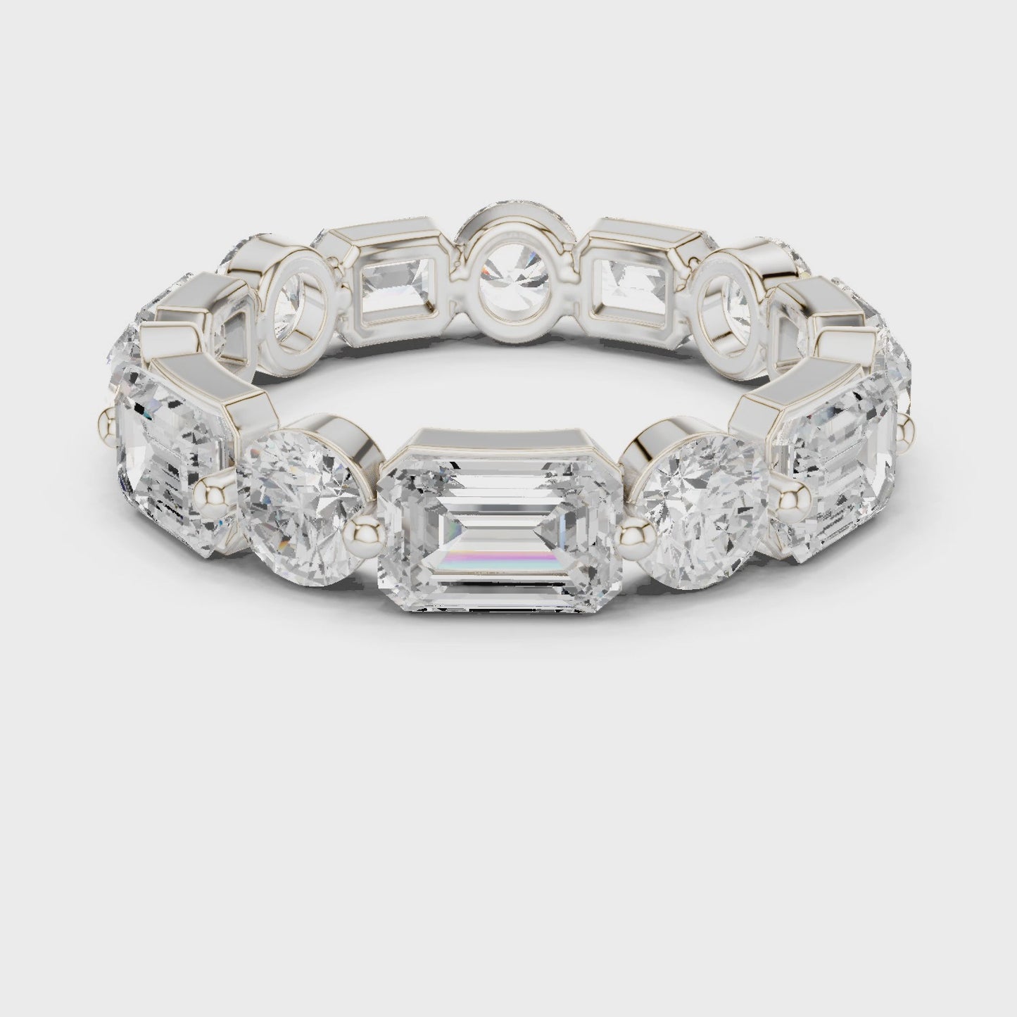Dual Rhythm Emerald & Round Diamond Eternity Band Ring