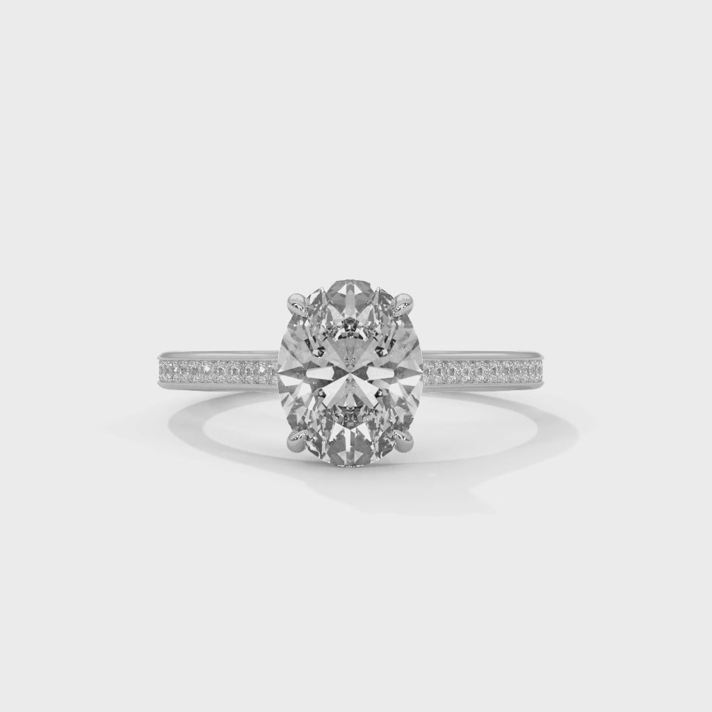 Eterna Oval Solitaire Engagement Ring with Pavé Diamond Band