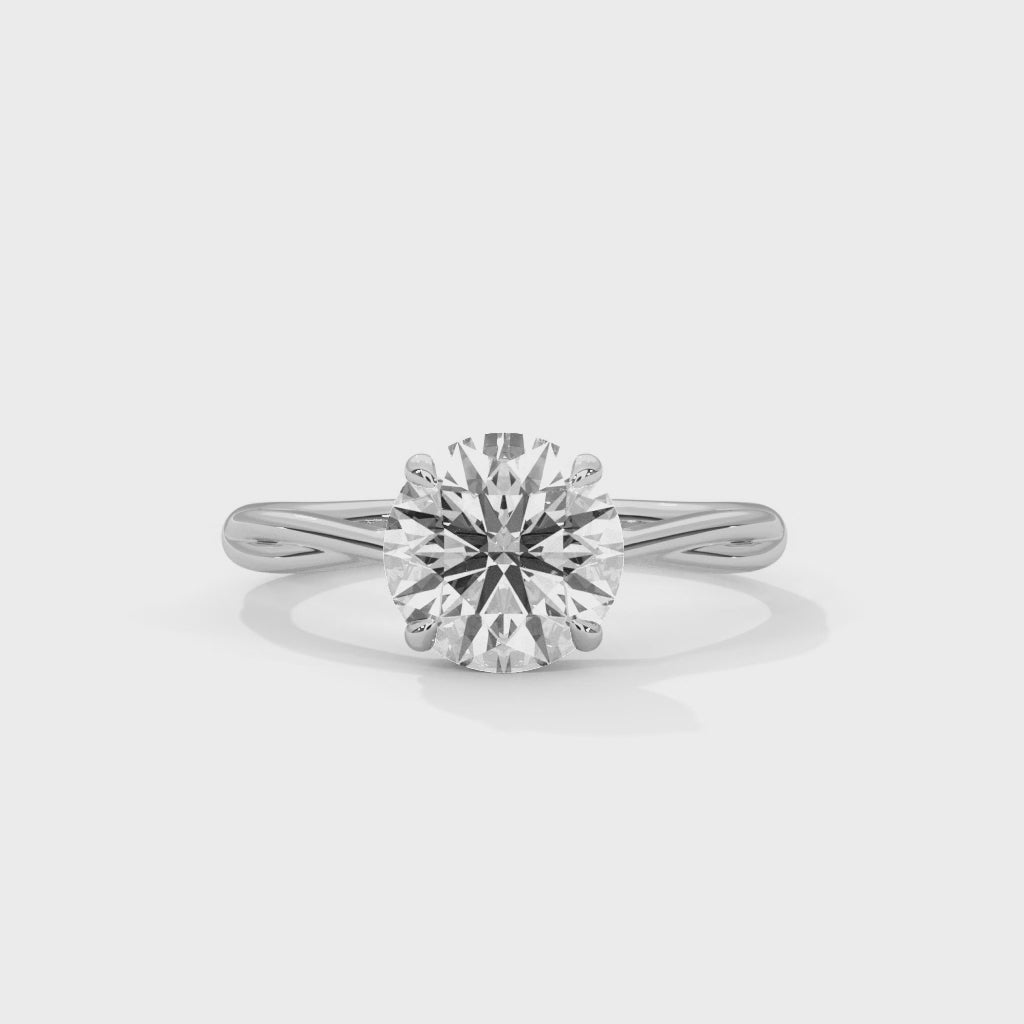 Eterna Twisted Round Cut Solitaire Engagement Ring