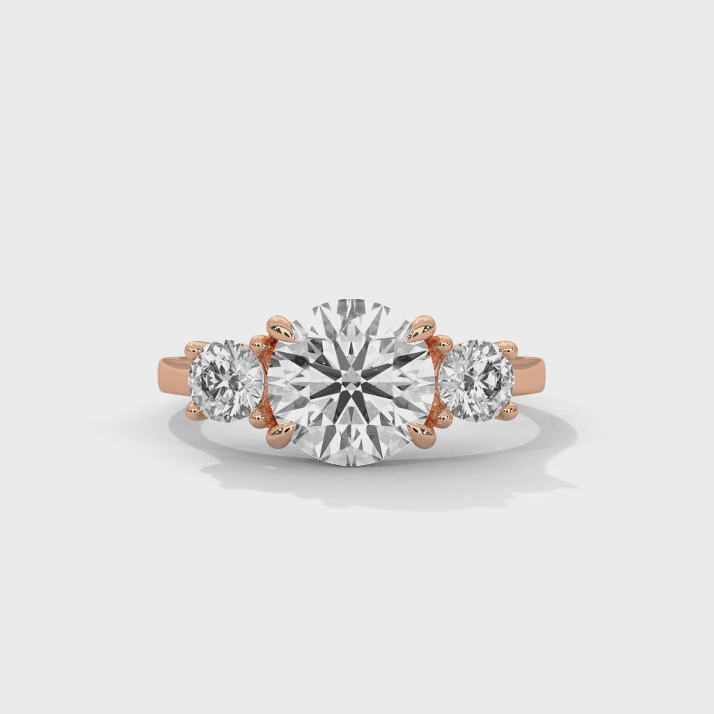 Vintage Round Three Stone Engagement Ring with Classic Prong Setting