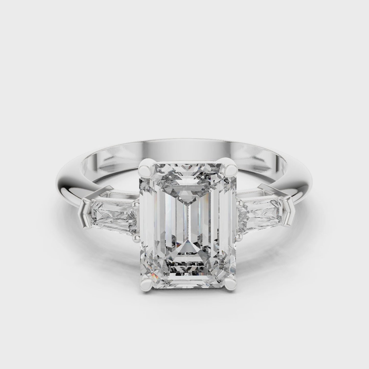 Linear Edge Emerald Cut Three Stone Diamond Ring