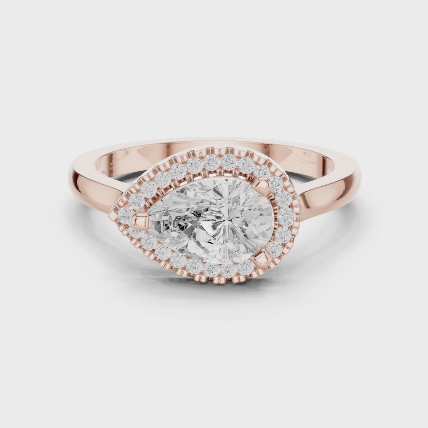 Contour Pear Diamond Halo Engagement Ring