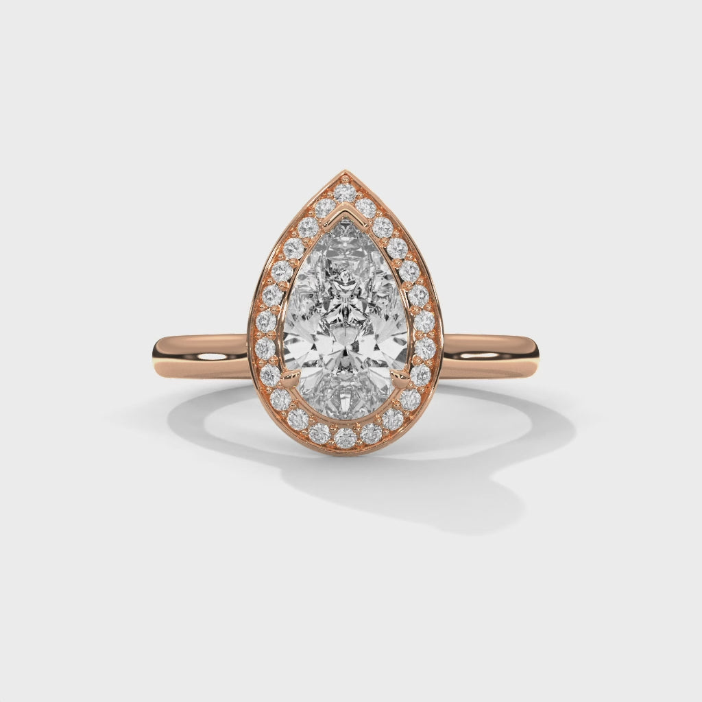 Luminous Drop Pear Halo Diamond Statement Ring