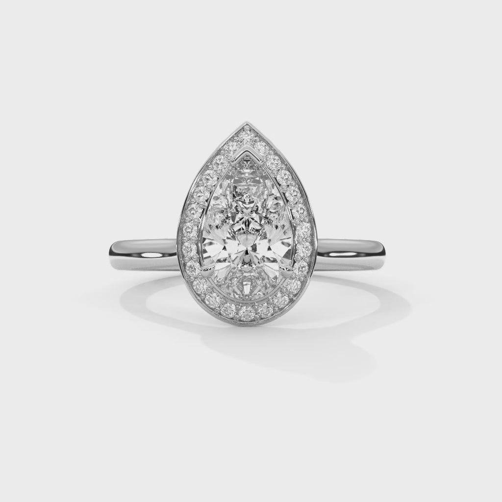 Luminous Drop Pear Halo Diamond Statement Ring