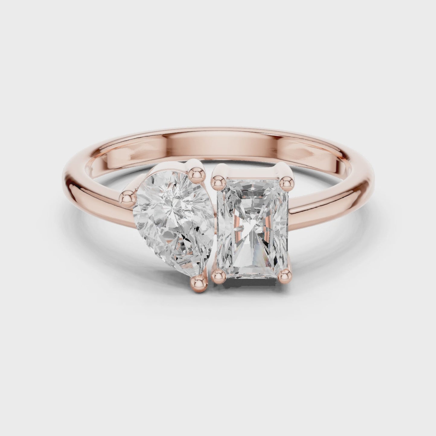 Axis Shift Pear & Emerald Two Stone Diamond Ring