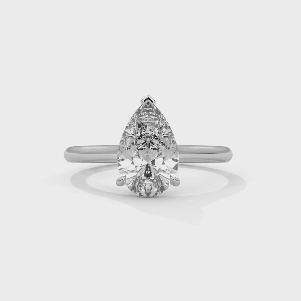 Élan Pear Cut Solitaire Engagement Ring with Knife-Edge Band