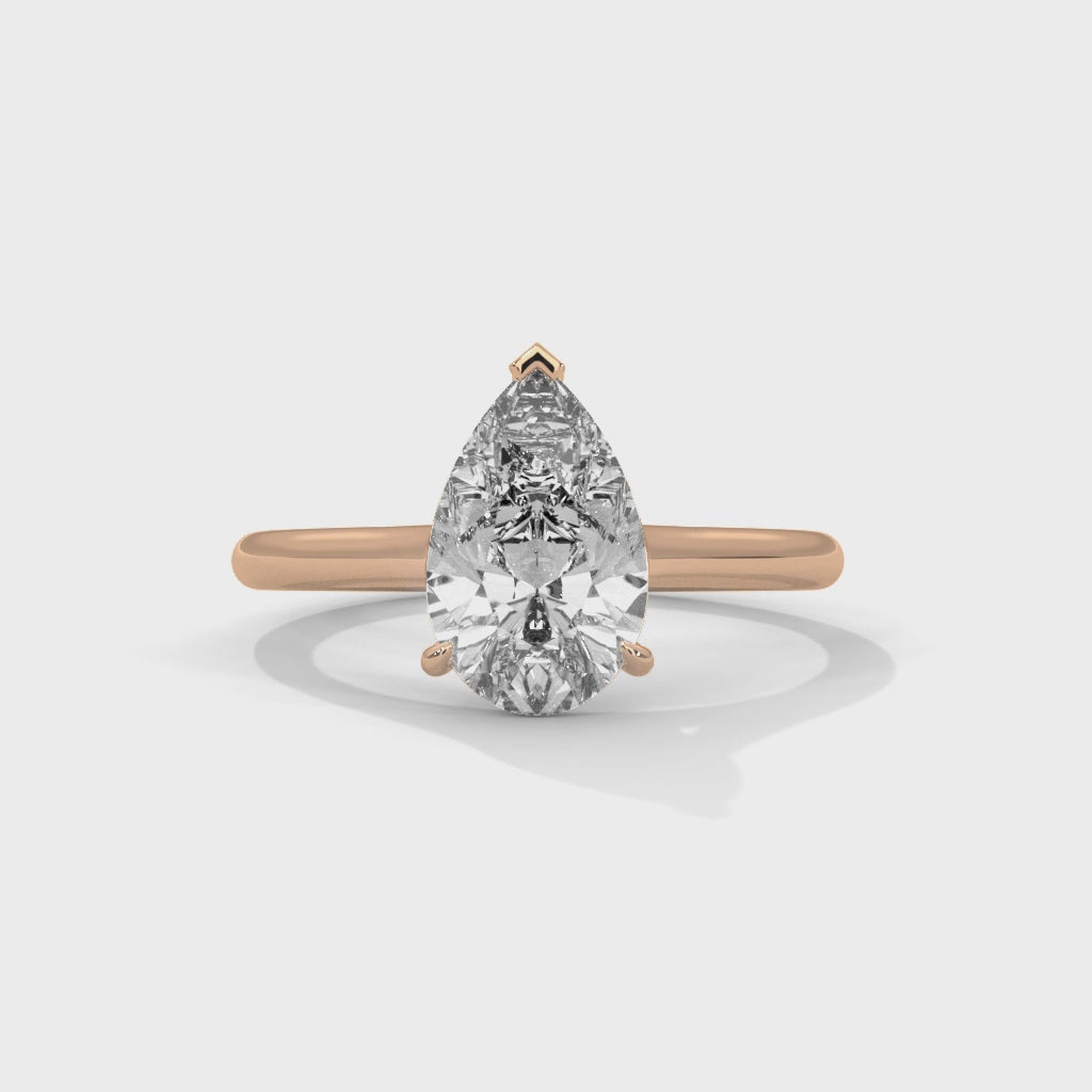Élan Pear Cut Solitaire Engagement Ring with Knife-Edge Band