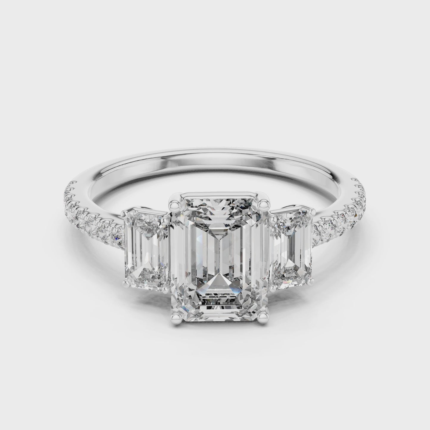 Axis Emerald Cut Three Stone Diamond Ring