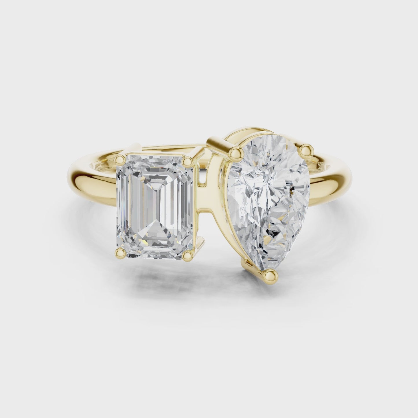 Dual Perspective Emerald & Pear Toi et Moi Diamond Ring