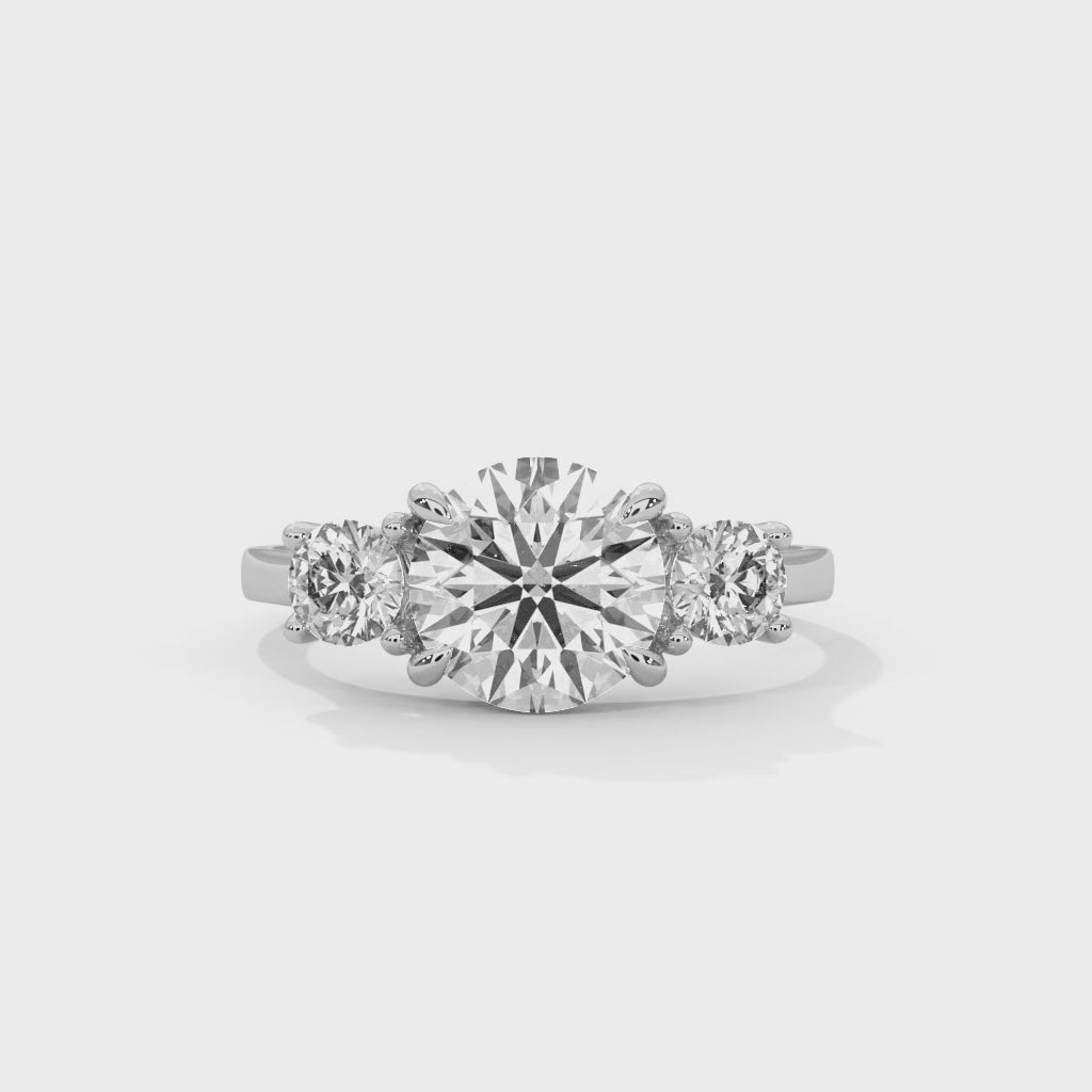 Vintage Round Three Stone Engagement Ring with Classic Prong Setting