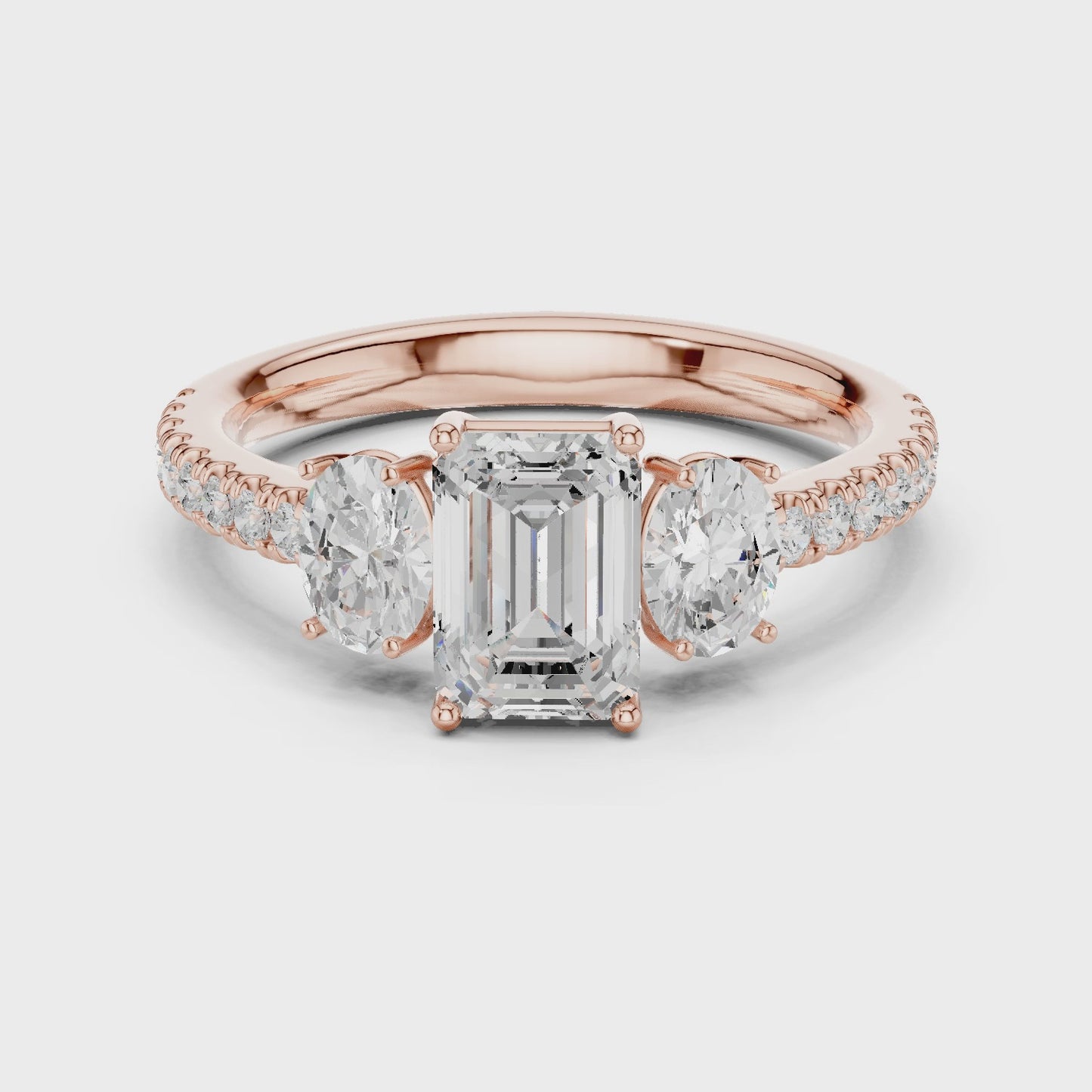 Axis Radiance Emerald & Oval Three Stone Diamond Ring