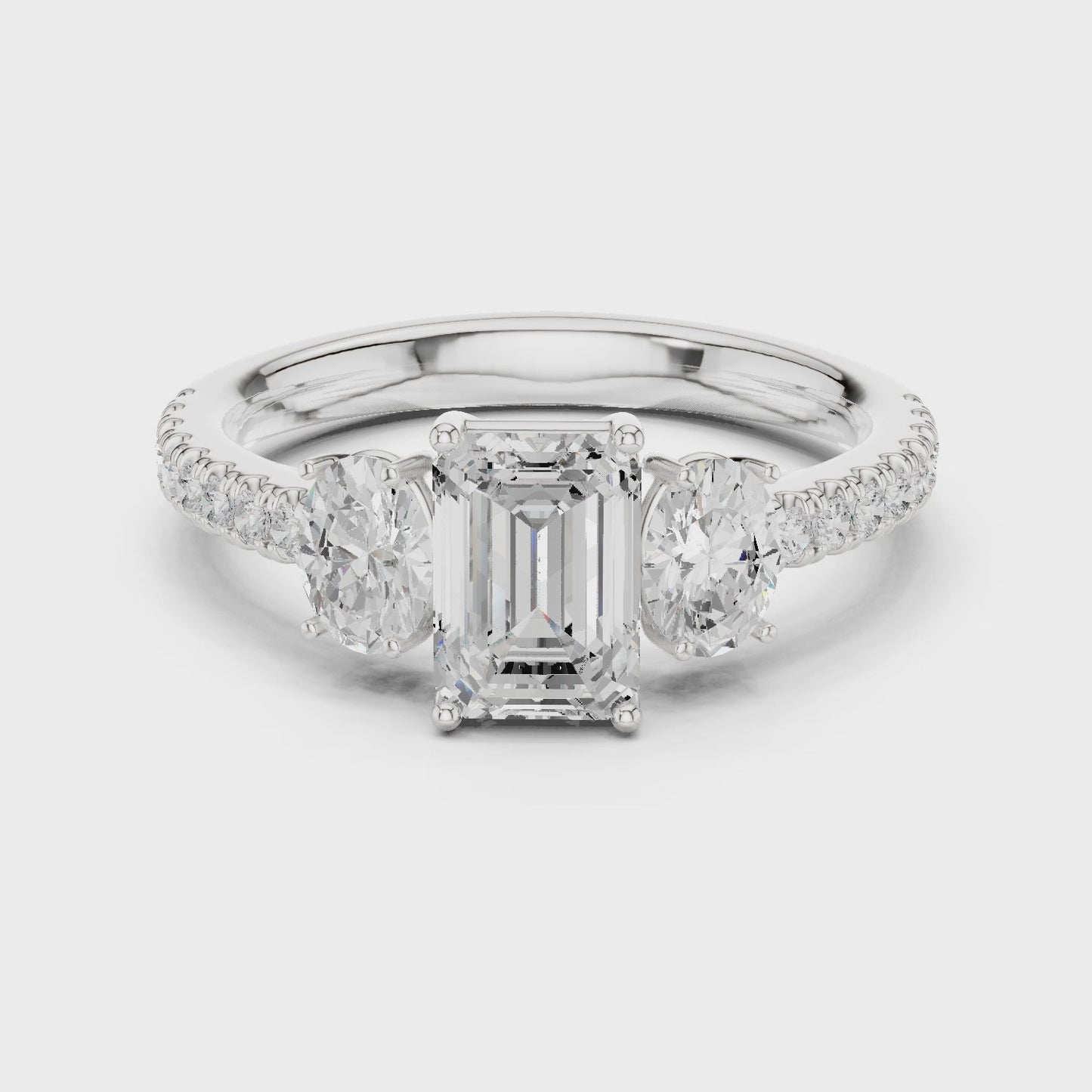 Axis Radiance Emerald & Oval Three Stone Diamond Ring