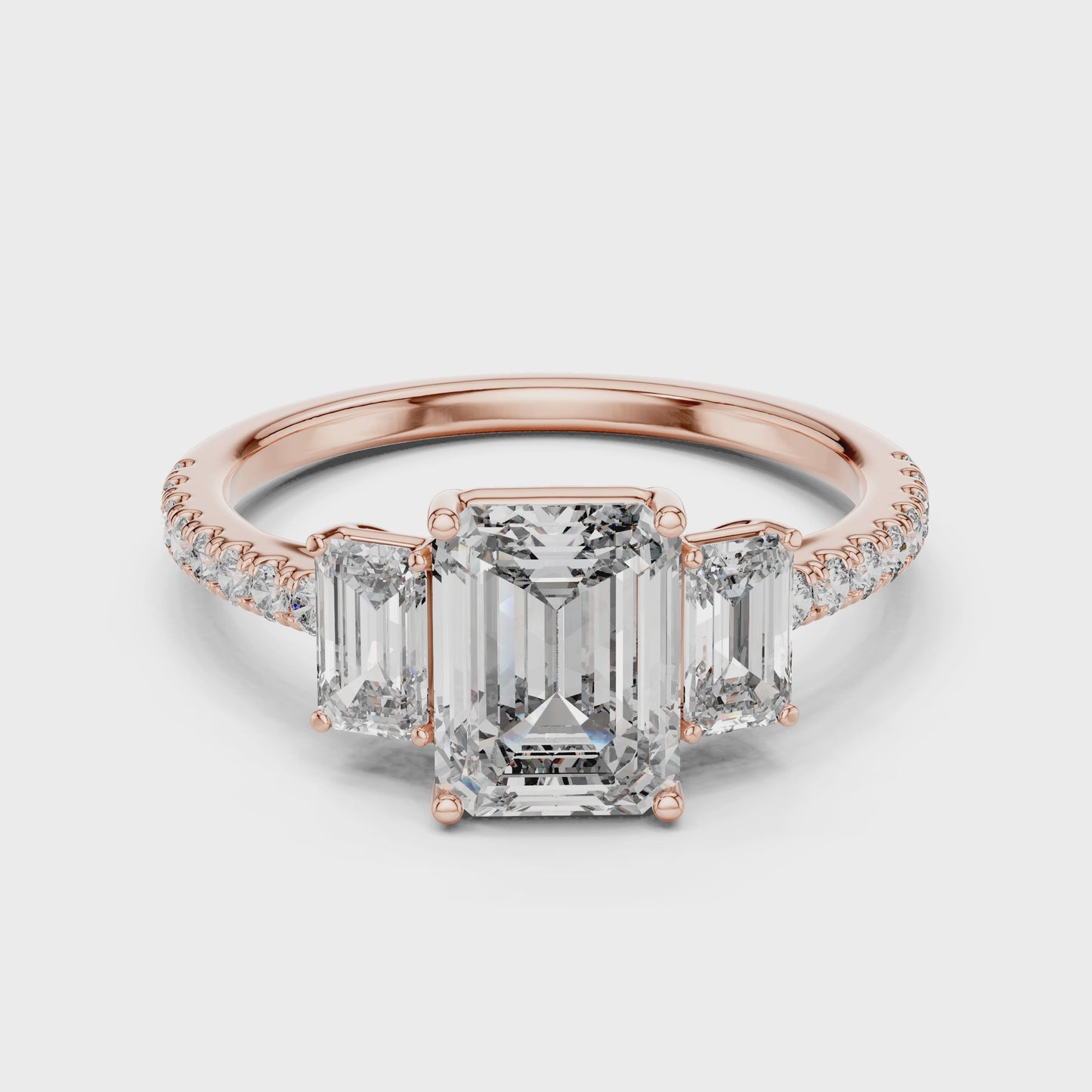 Axis Emerald Cut Three Stone Diamond Ring