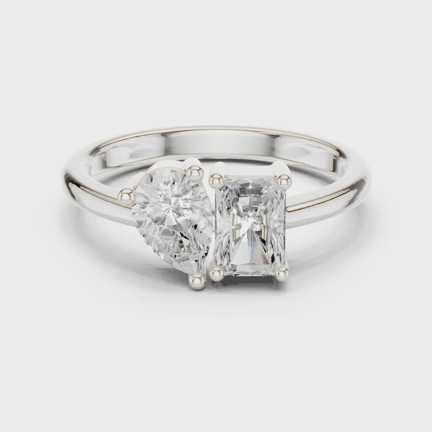 Axis Shift Pear & Emerald Two Stone Diamond Ring