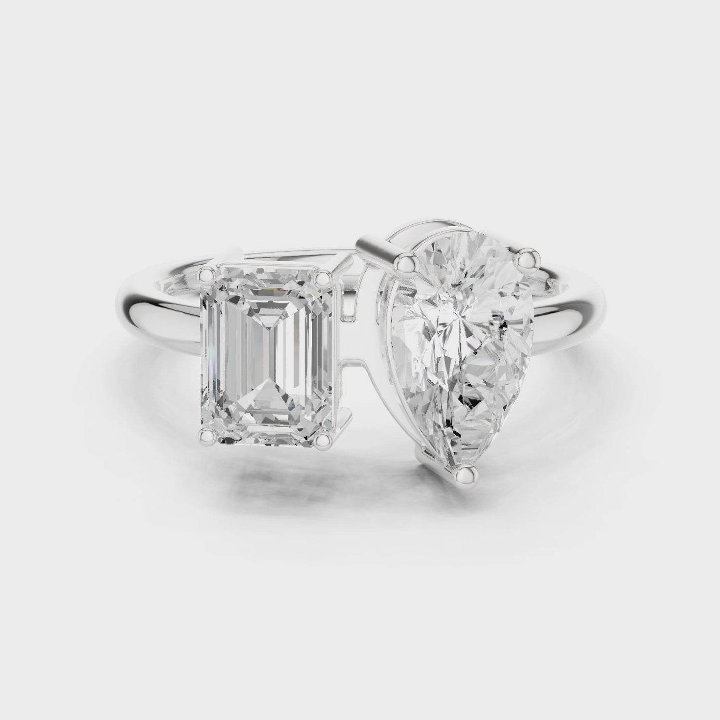 Dual Perspective Emerald & Pear Toi et Moi Diamond Ring