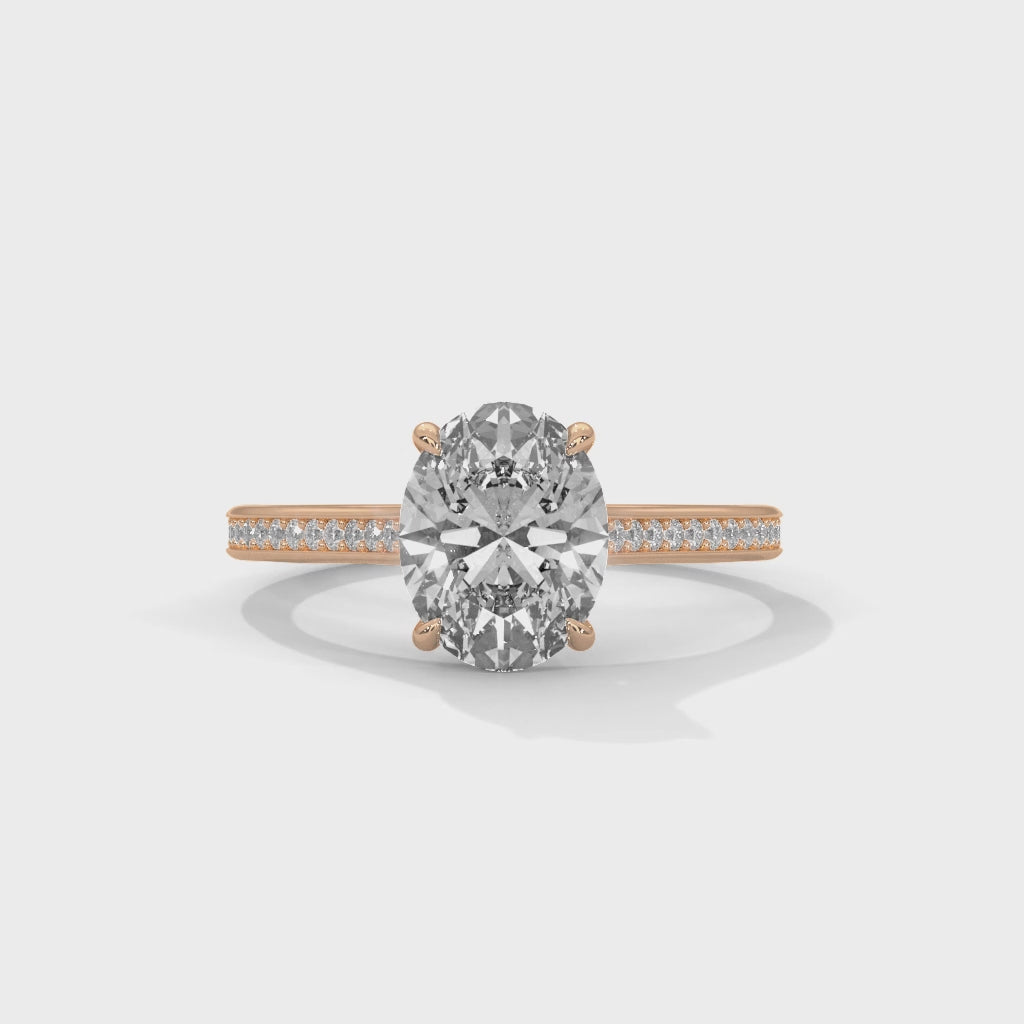 Eterna Oval Solitaire Engagement Ring with Pavé Diamond Band