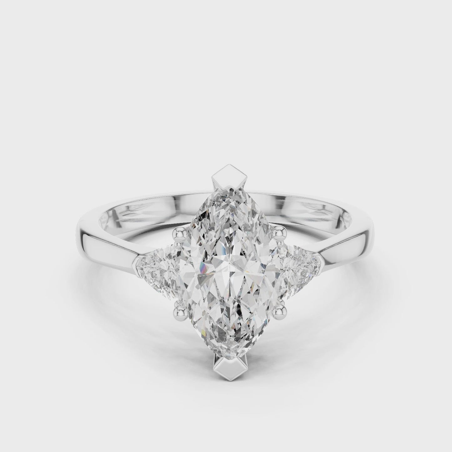 Celestia Pear Cut Three Stone Engagement Ring