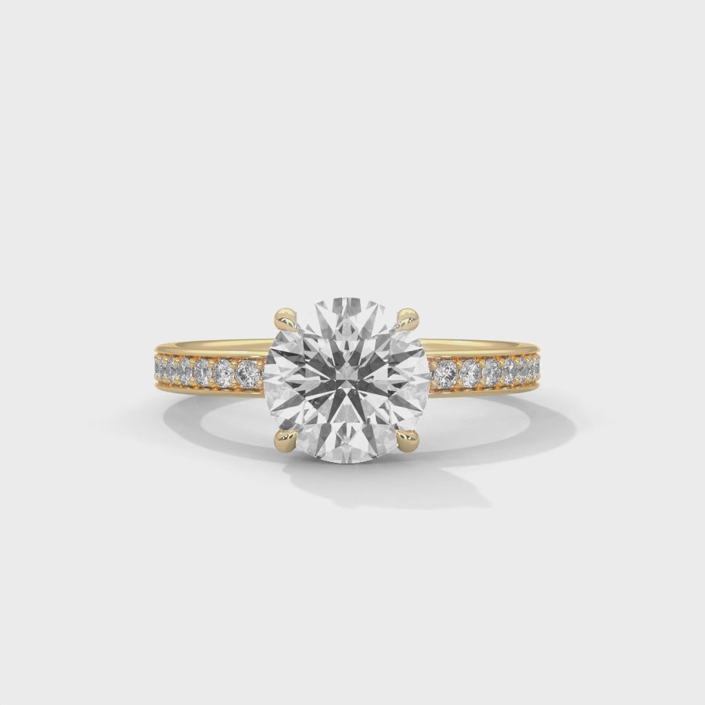 Luméra Grace Round Cut Solitaire Engagement Ring with Pavé Band