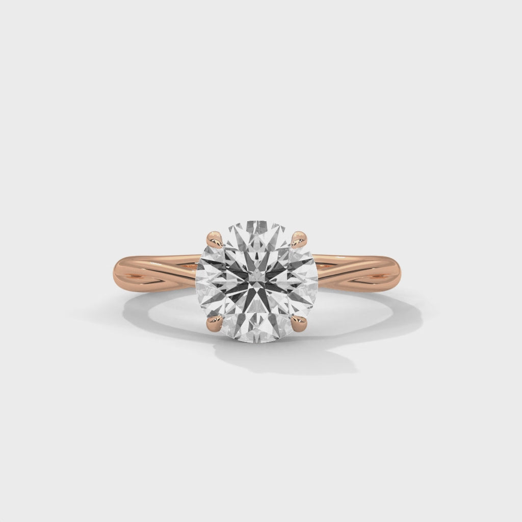 Eterna Twisted Round Cut Solitaire Engagement Ring