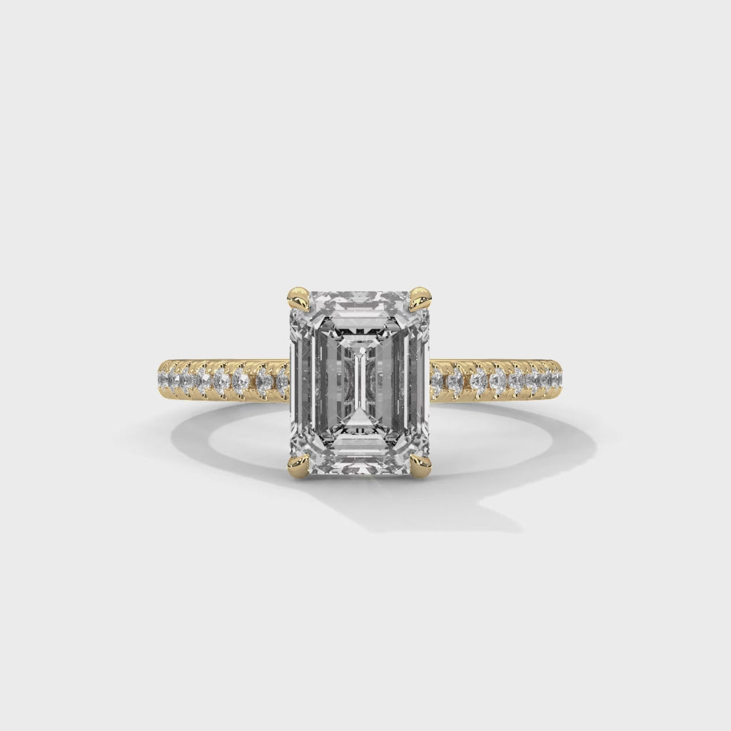 Regal Prism Emerald Cut Solitaire Engagement Ring with Pavé Band