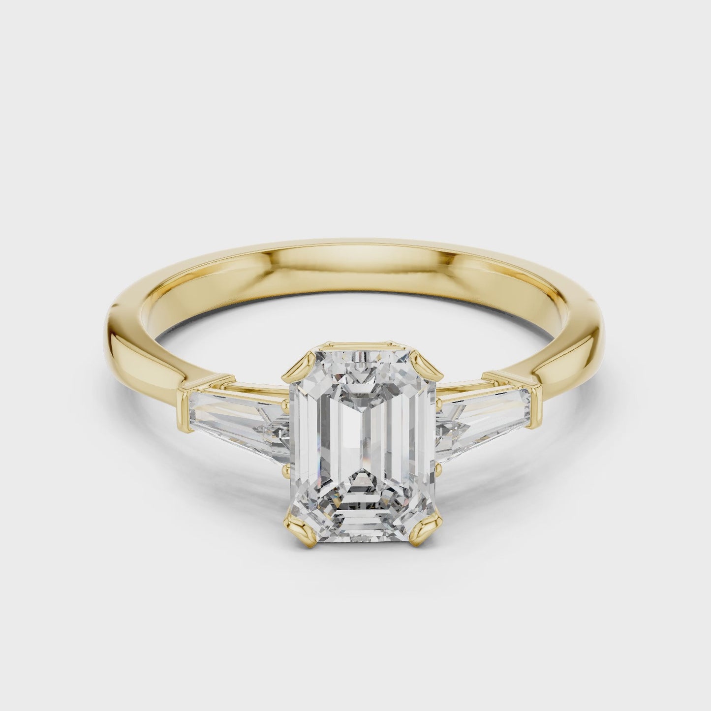 Emerald Cut Three Stone Engagement Ring with Tapered Side Stones