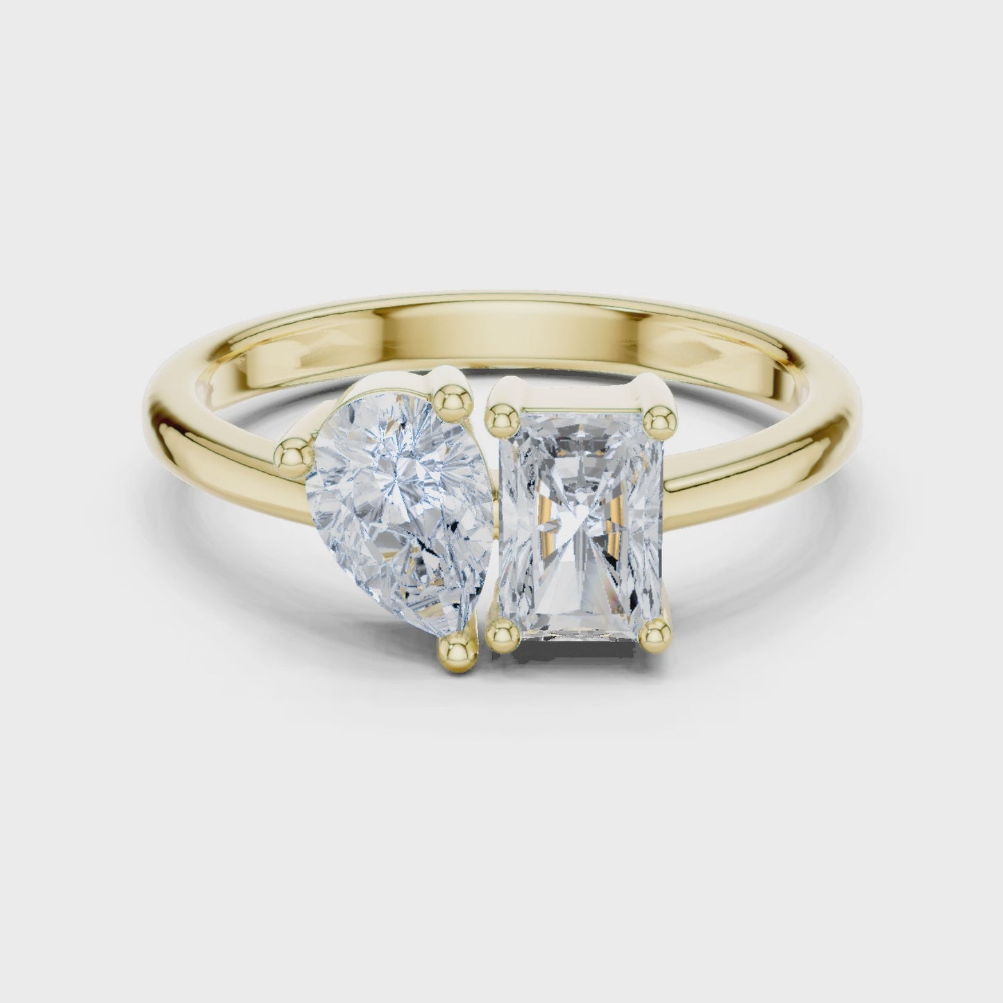 Axis Shift Pear & Emerald Two Stone Diamond Ring