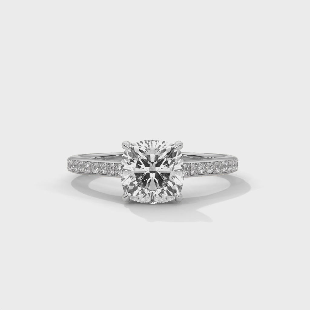 LumiCush Essence Cushion Cut Solitaire Engagement Ring with Pavé Diamond Band